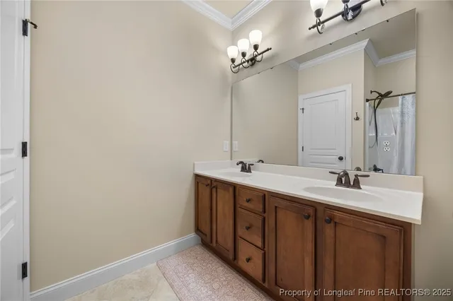 a bathroom with a double vanity sink and a mirror