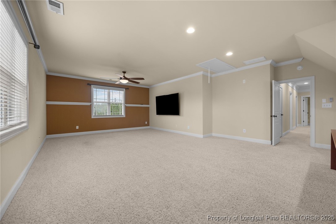 335 Lancelot Court Linden, NC 28356 - Photo 28 of 50 an empty room with windows and fireplace