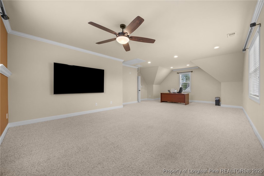 335 Lancelot Court Linden, NC 28356 - Photo 29 of 50 a view of empty room with wooden floor and fan
