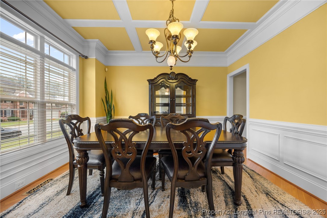 335 Lancelot Court Linden, NC 28356 - Photo 32 of 50 a view of a dining room with furniture and chandelier