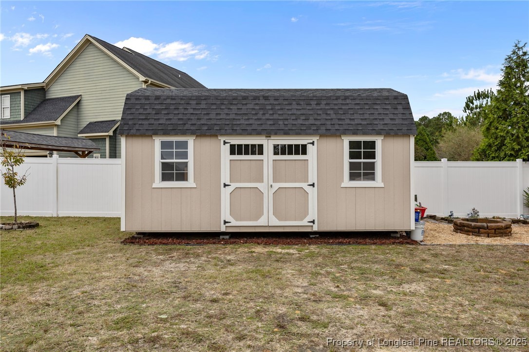 335 Lancelot Court Linden, NC 28356 - Photo 46 of 50 a house view with a garden space