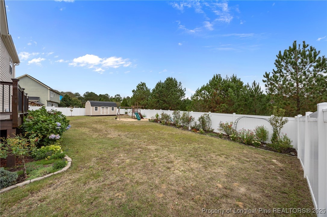 335 Lancelot Court Linden, NC 28356 - Photo 47 of 50 a view of swimming pool with a yard