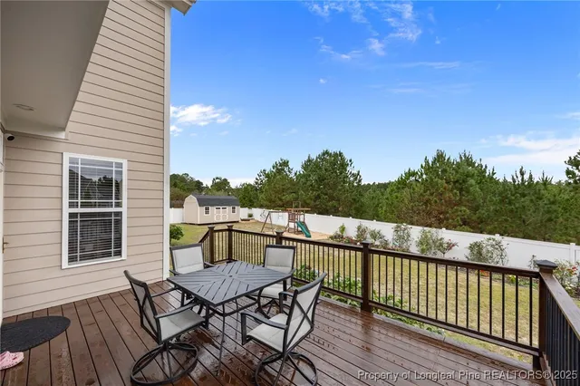 a view of a chairs on the roof deck