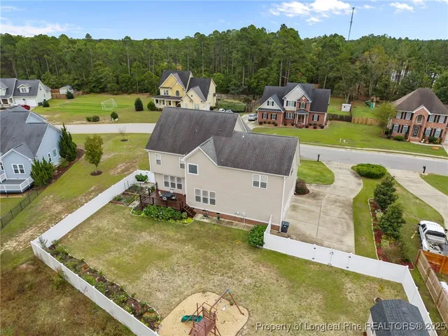 a view of a swimming pool with a garden