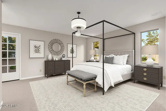 a kitchen with stainless steel appliances a stove a sink and a microwave