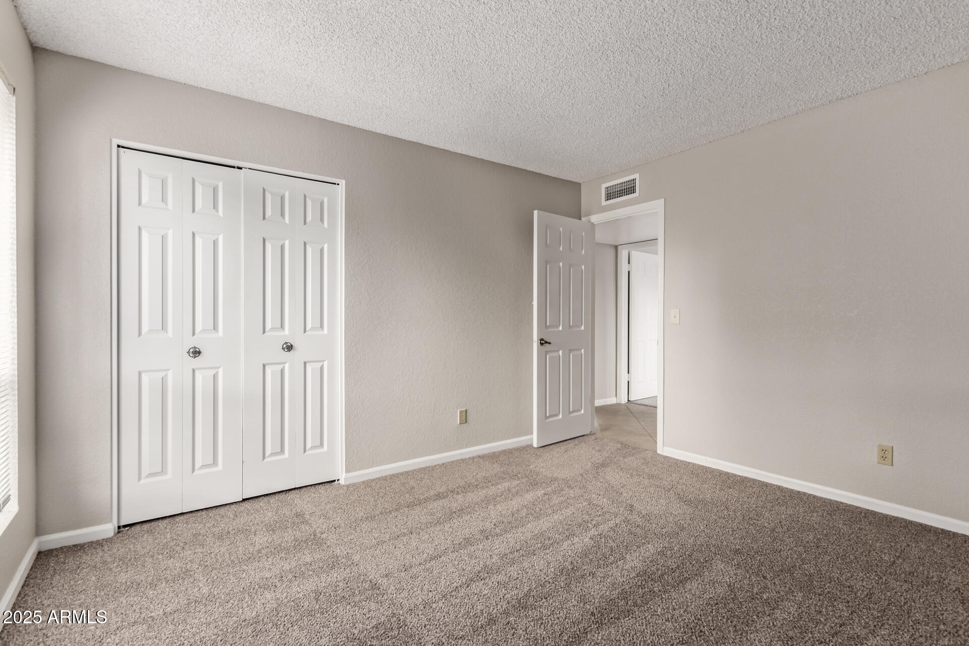 4912 East Ludlow Drive Scottsdale, AZ 85254 - Photo 28 of 36 a view of an empty room