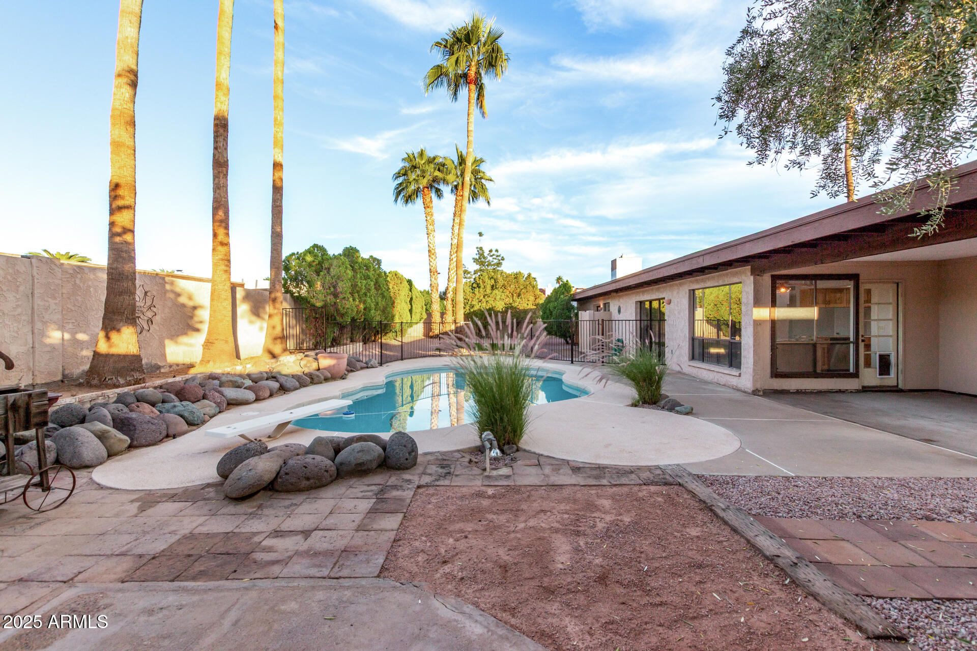 4912 East Ludlow Drive Scottsdale, AZ 85254 - Photo 33 of 36 a view of a house with backyard and patio