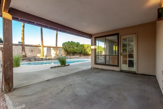 a view of outdoor space with swimming pool