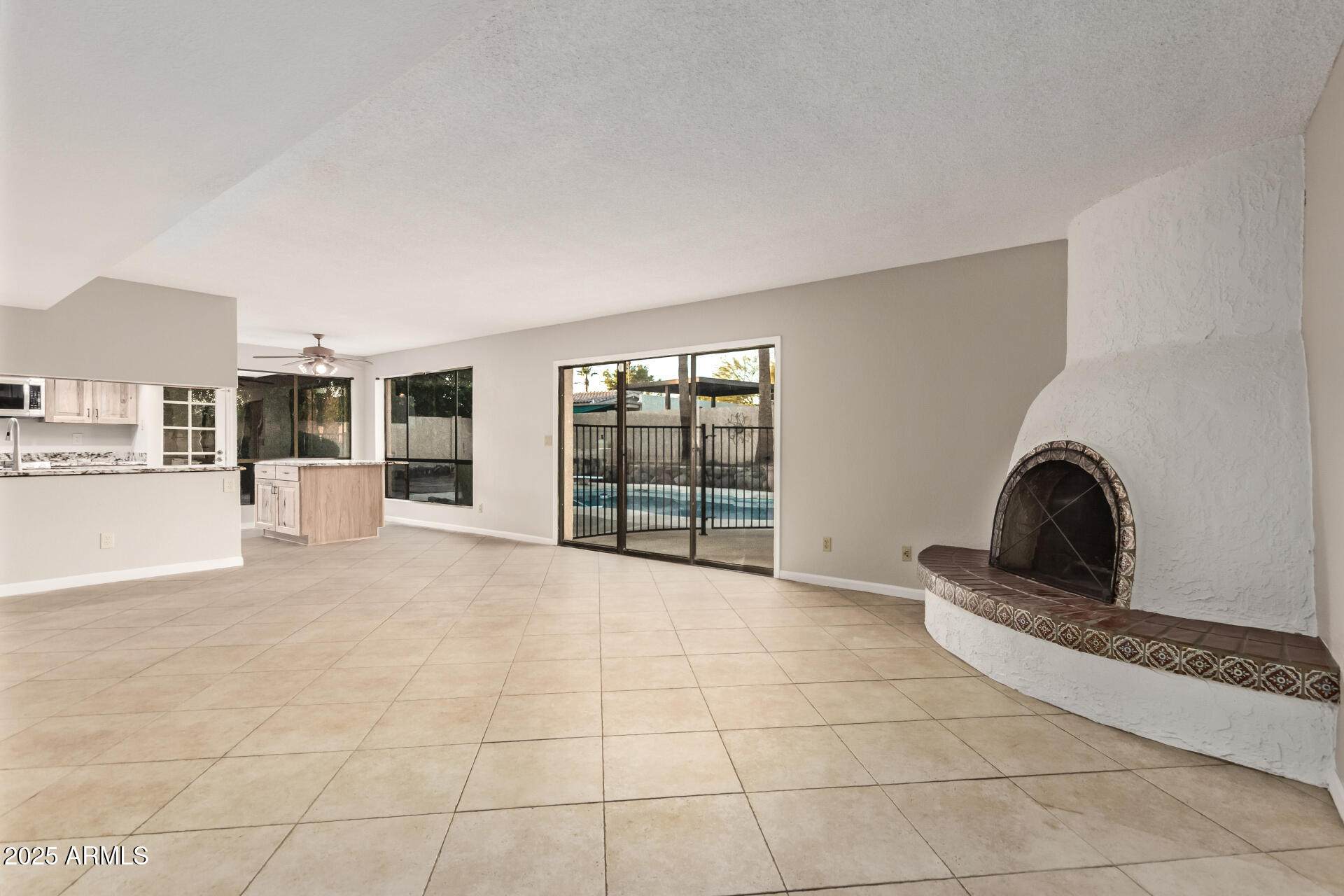 4912 East Ludlow Drive Scottsdale, AZ 85254 - Photo 9 of 36 a view of a livingroom with furniture and floor to ceiling window