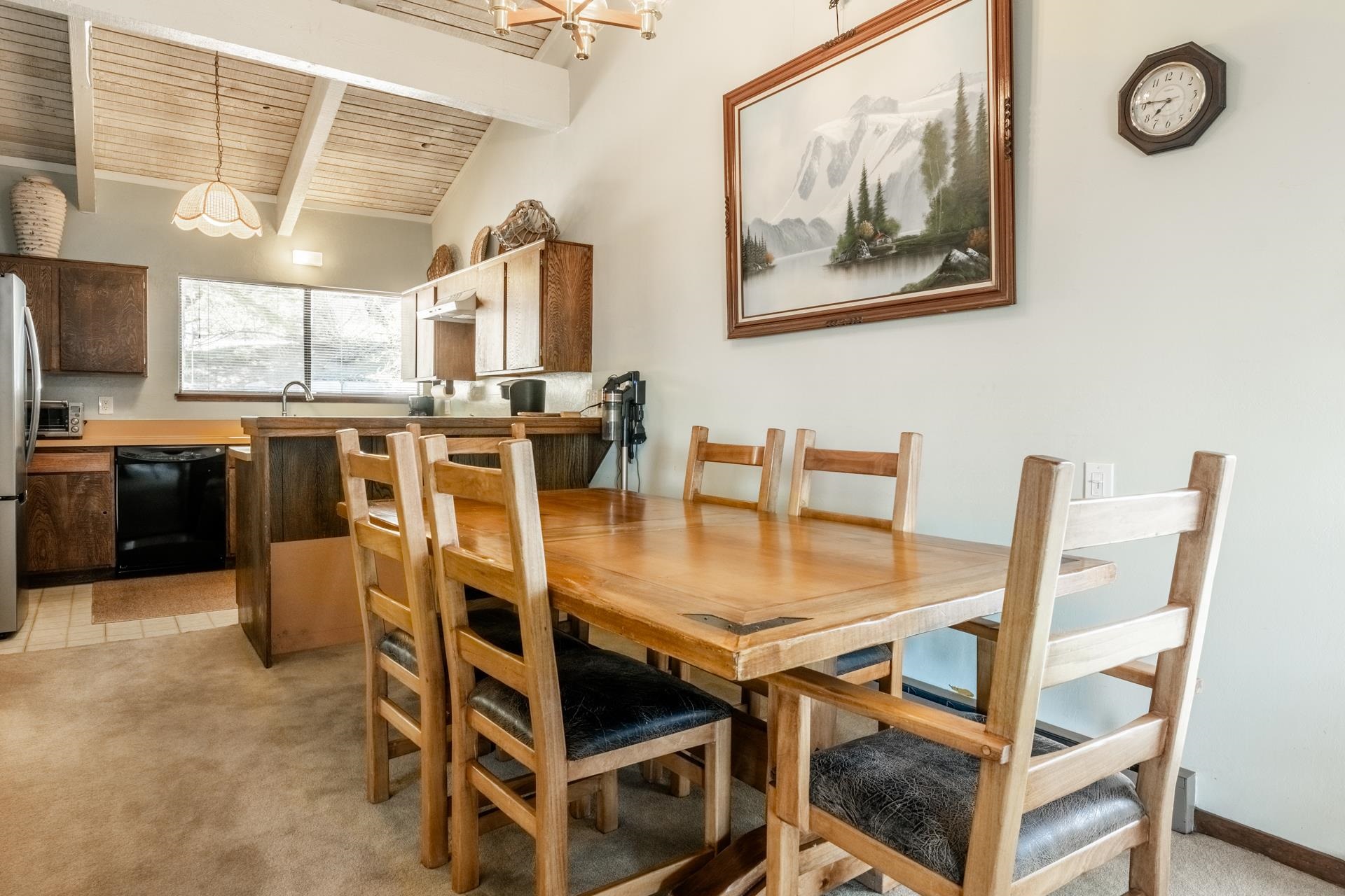 94 John Muir Road, Unit 132 Mammoth Lakes, CA 93546 - Photo 12 of 58 a view of a dining room with furniture window and wooden floor