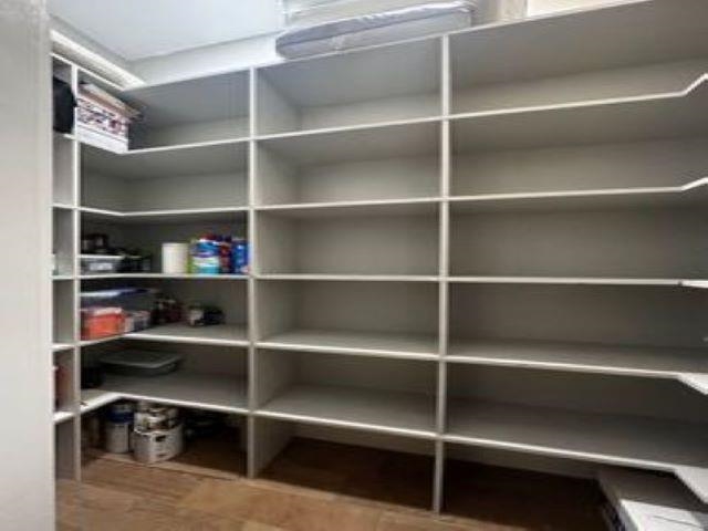 217 Liberty Road Jackson, TN 38305 - Photo 21 of 25 a view of walk in closet with empty racks