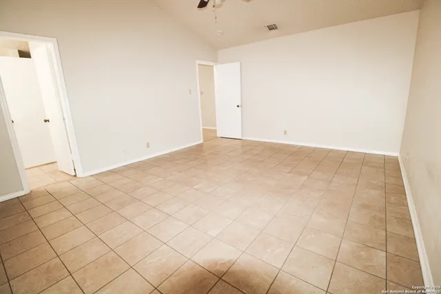 a bathroom with a bathtub sink and a mirror