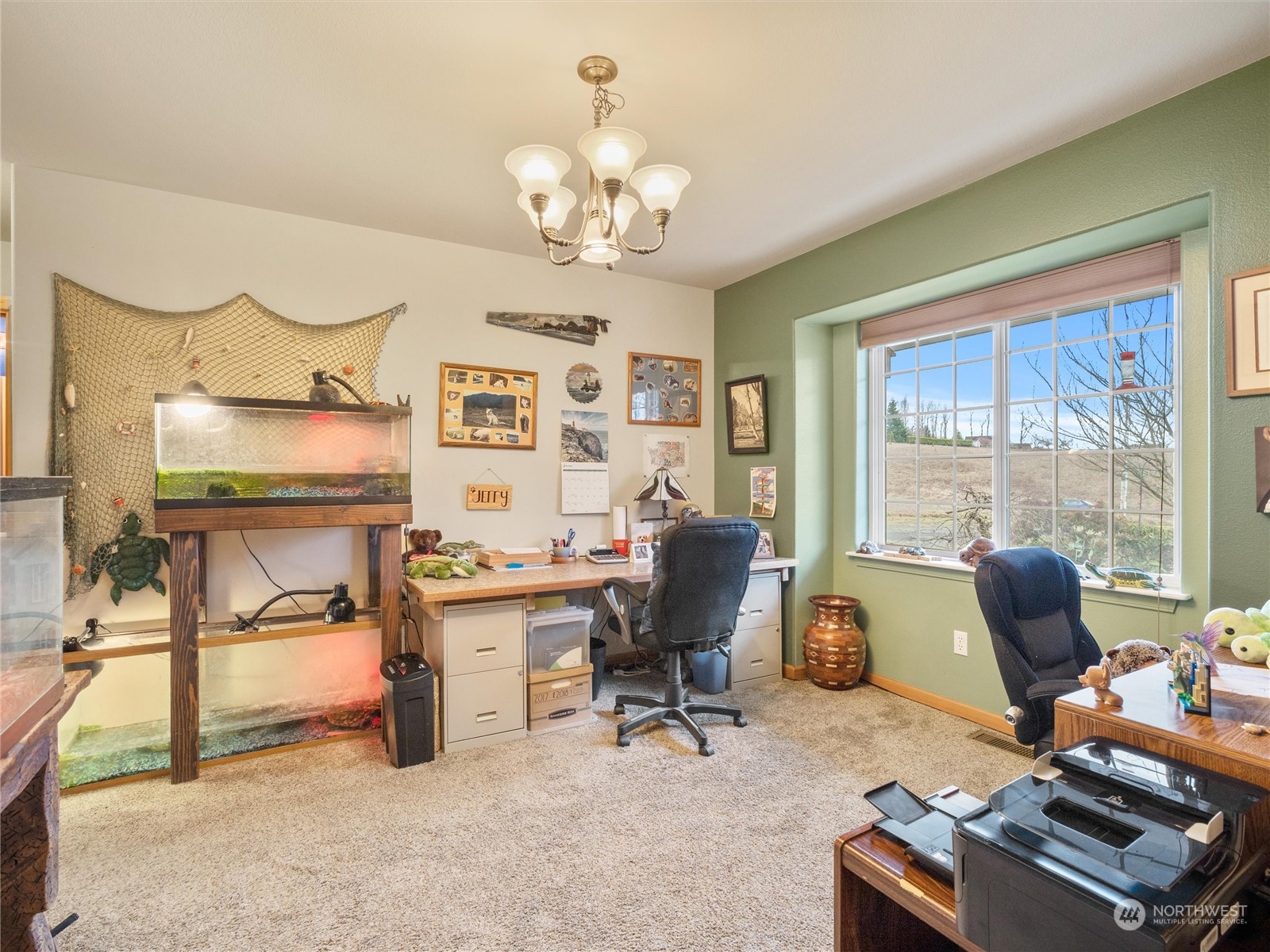 18615 Roseburg Street Southwest Rochester, WA 98579 - Photo 13 of 40 a view of a workspace with furniture and a window