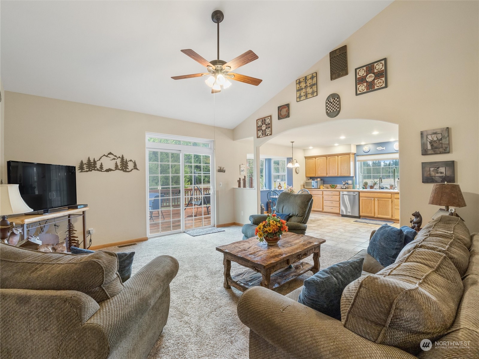 18615 Roseburg Street Southwest Rochester, WA 98579 - Photo 14 of 40 a living room with furniture and a large window