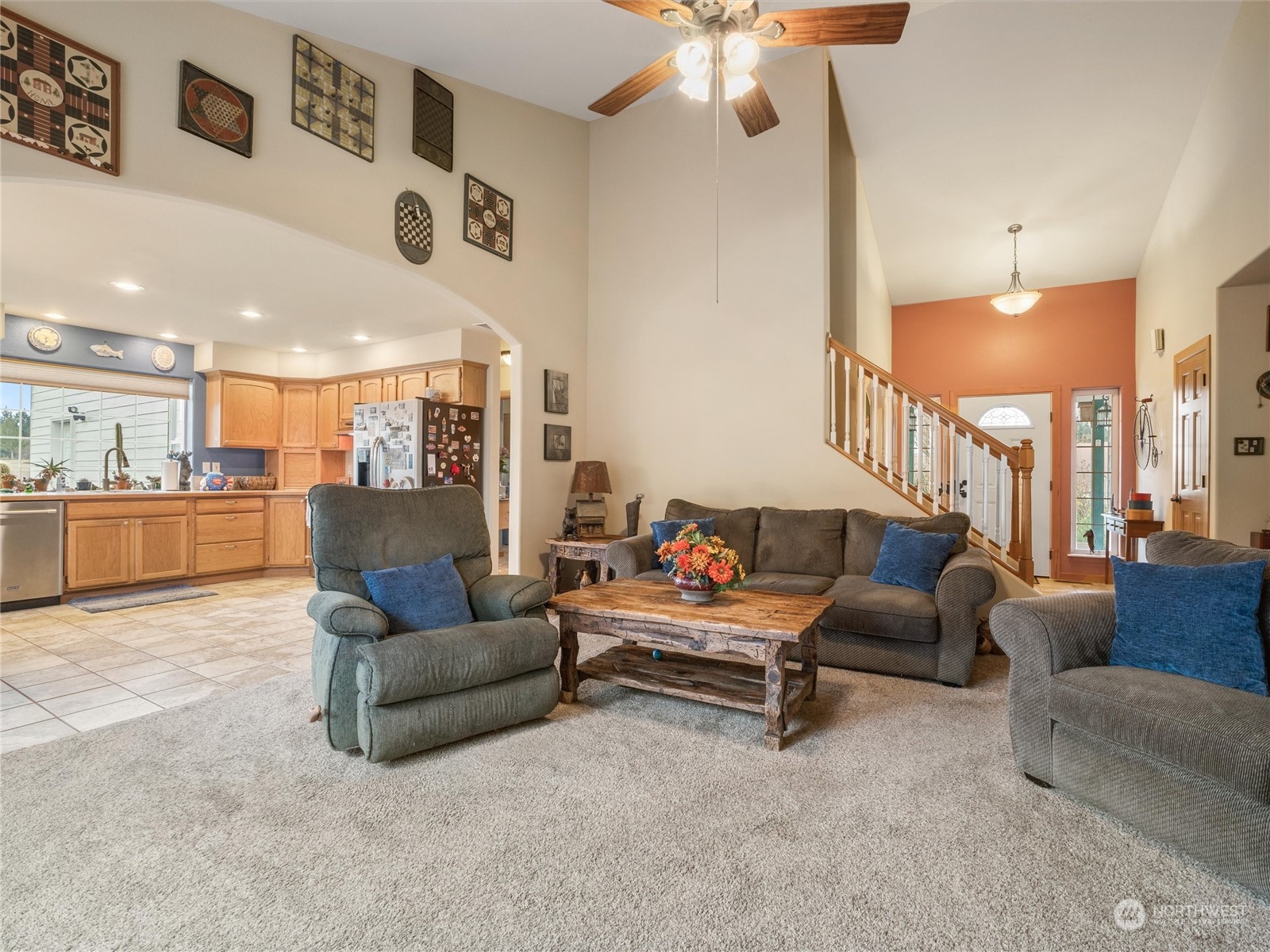 18615 Roseburg Street Southwest Rochester, WA 98579 - Photo 15 of 40 a living room with furniture and a kitchen view