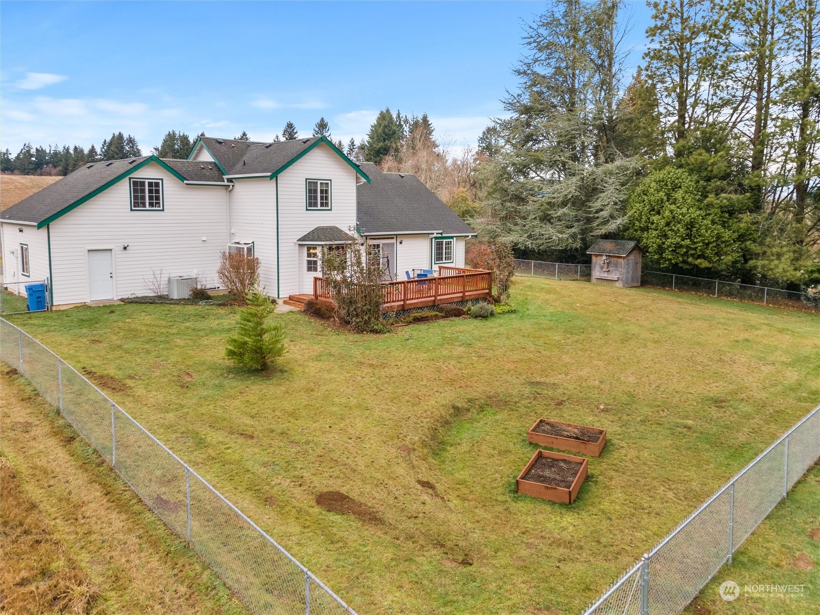 18615 Roseburg Street Southwest Rochester, WA 98579 - Photo 36 of 40 a view of a house with a yard