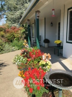 18615 Roseburg Street Southwest Rochester, WA 98579 - Photo 38 of 40 a front view of a house with a yard