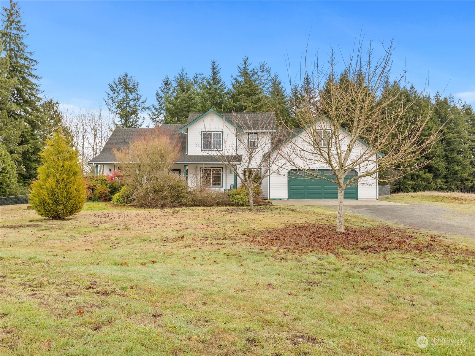 18615 Roseburg Street Southwest Rochester, WA 98579 - Photo 4 of 40 a house with a yard