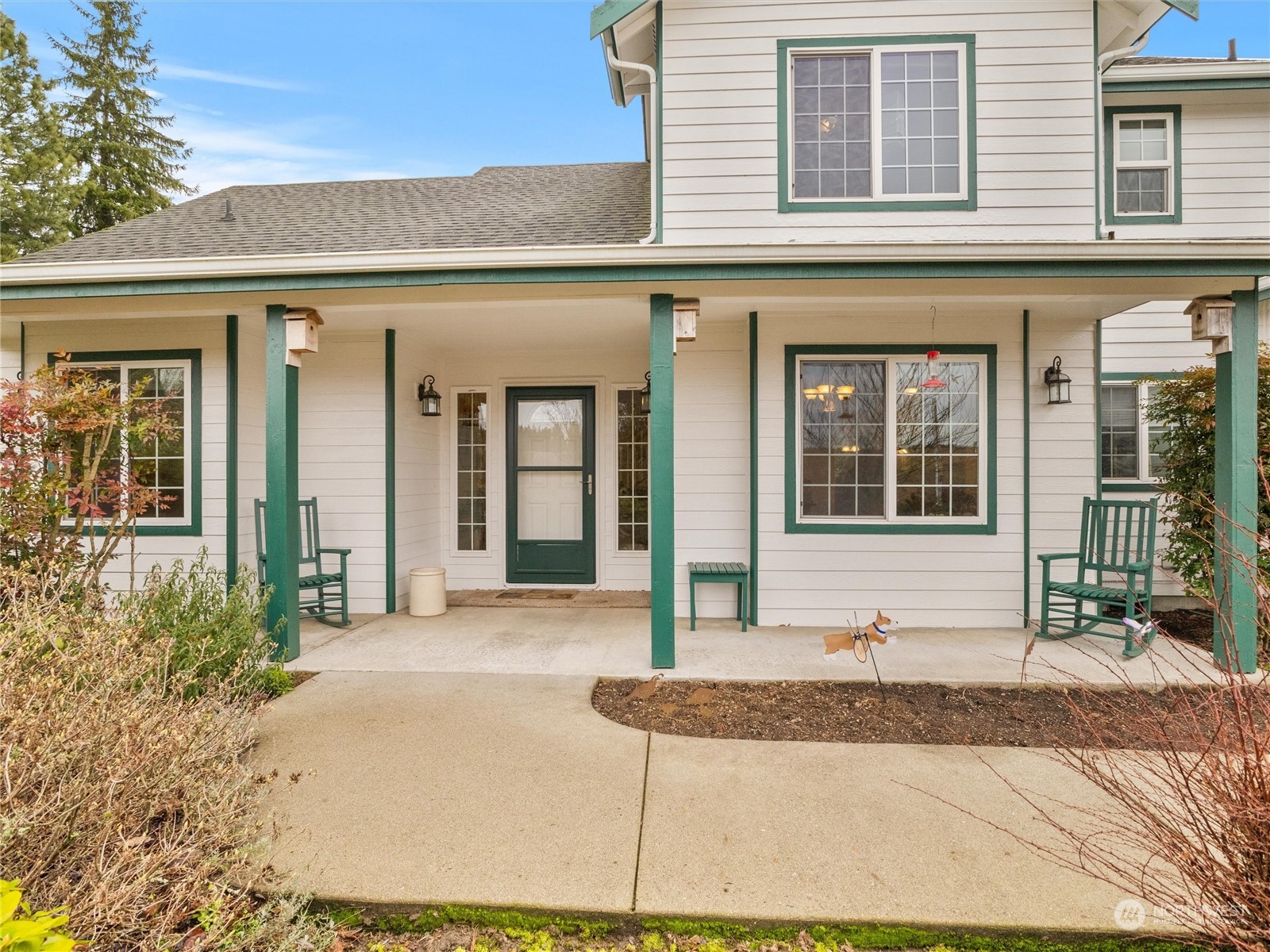 18615 Roseburg Street Southwest Rochester, WA 98579 - Photo 5 of 40 a front view of a house with garden