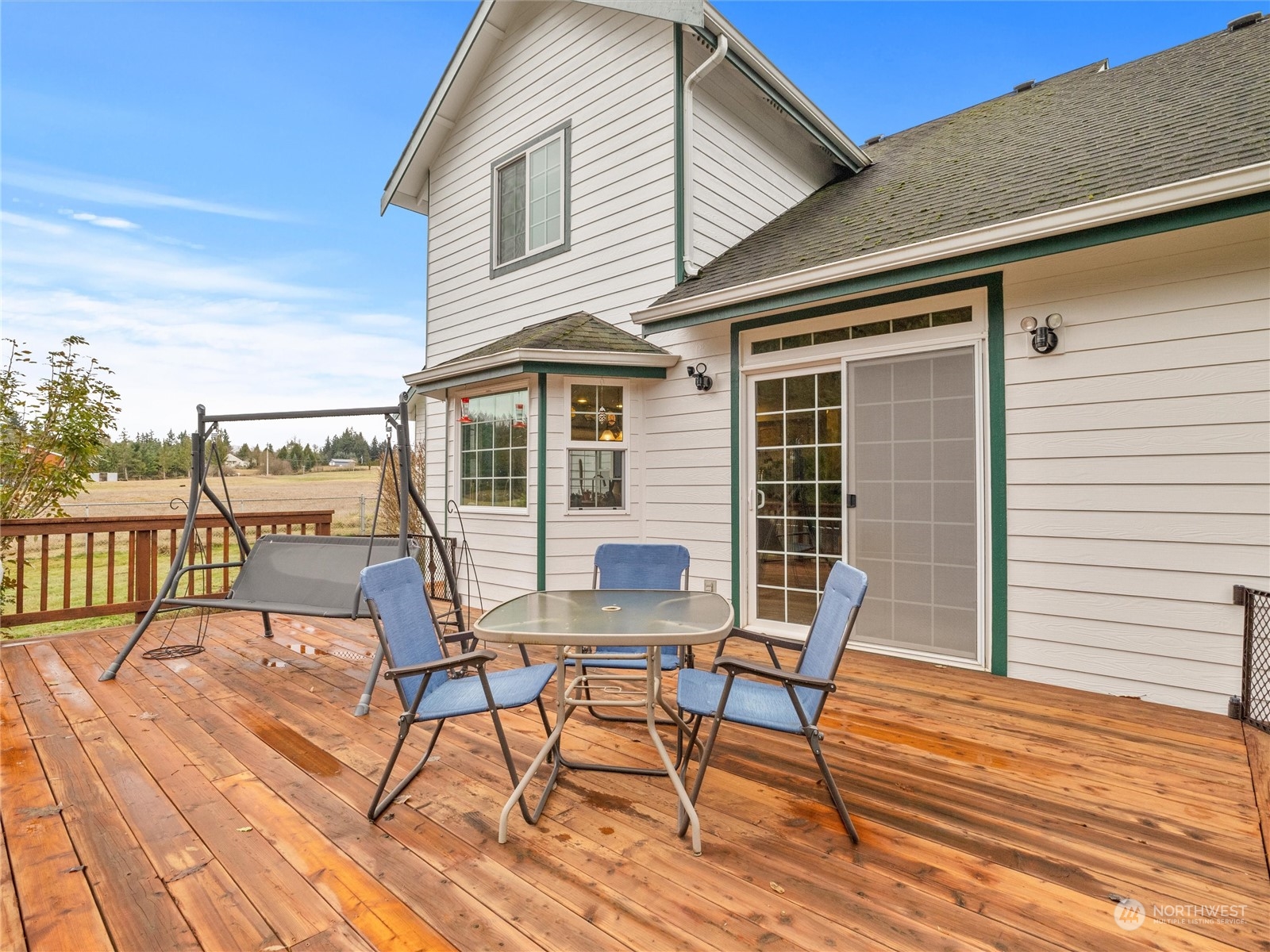 18615 Roseburg Street Southwest Rochester, WA 98579 - Photo 10 of 40 a patio with table and chairs