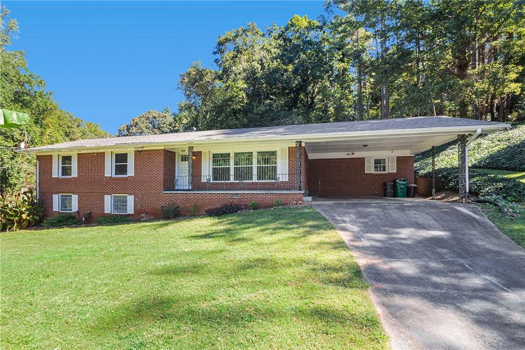 2412 Dawn Drive Decatur, GA 30032 - Photo 1 of 1 a view of a house with a yard