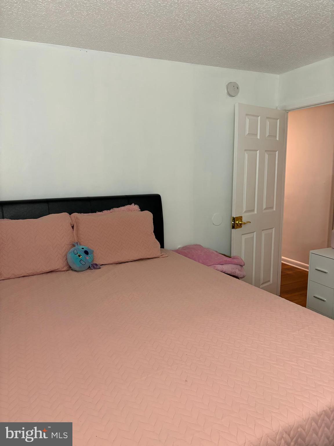 7404 Wyndam Road Pennsauken, NJ 08110 - Photo 30 of 50 a bedroom with a bed and a night stand