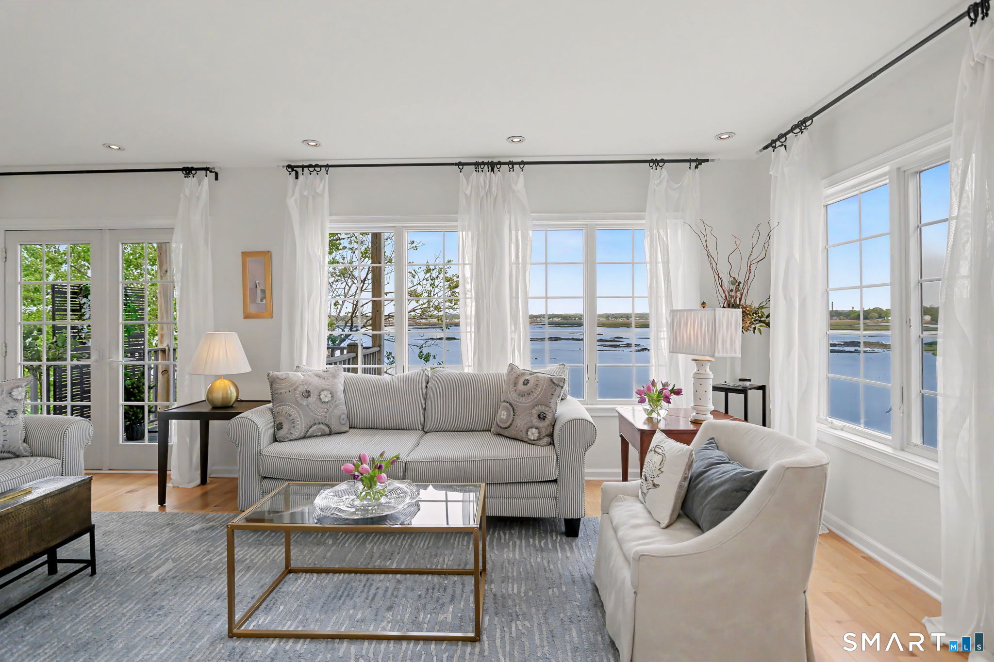 28 Milford Point Road Milford, CT 06460 - Photo 4 of 40 Living Room with gorgeous water views.