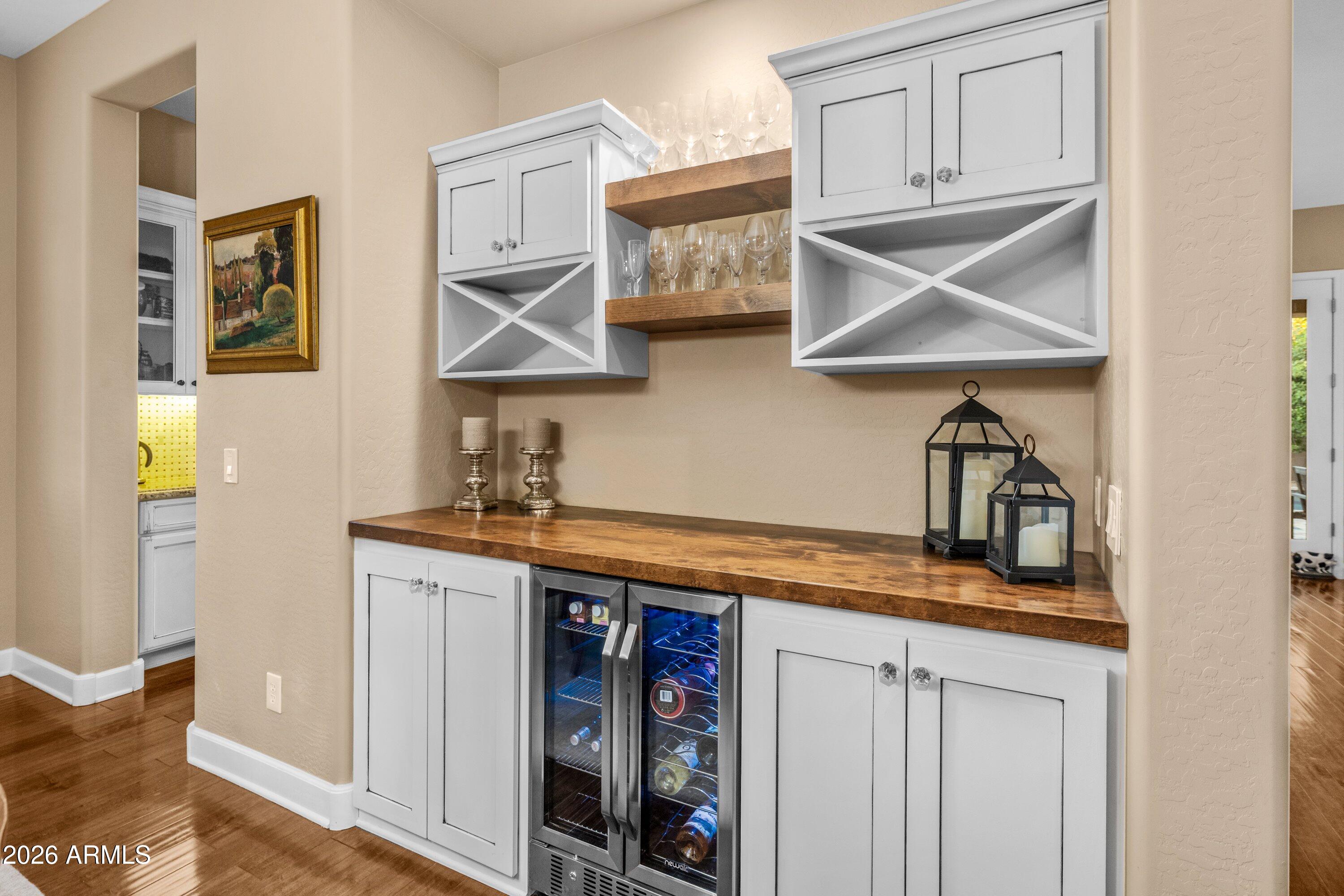 3738 East Riopelle Avenue Gilbert, AZ 85298 - Photo 11 of 97 a kitchen with stainless steel appliances granite countertop a sink and cabinets