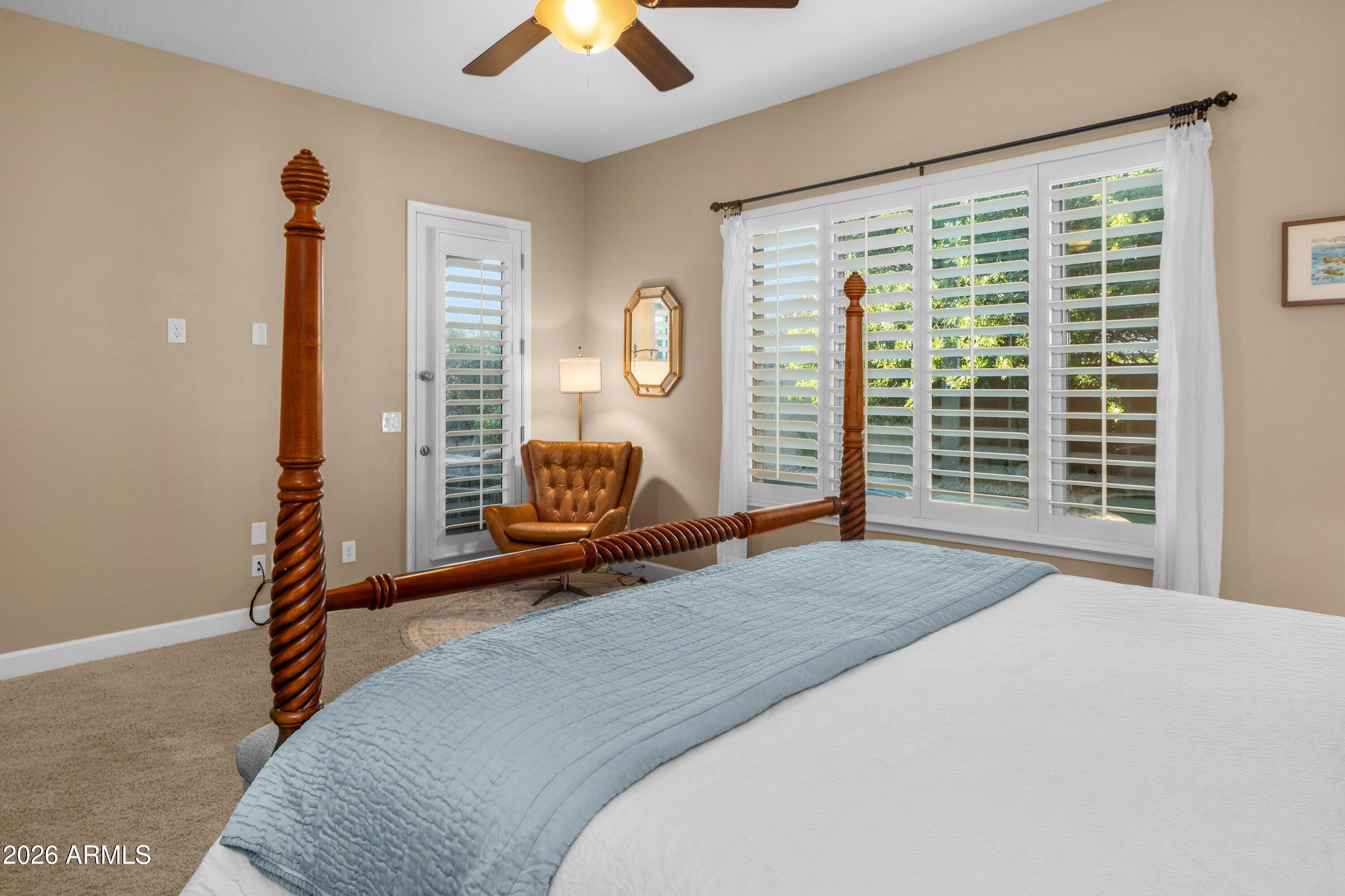 3738 East Riopelle Avenue Gilbert, AZ 85298 - Photo 28 of 97 a bedroom with a bed and a large window