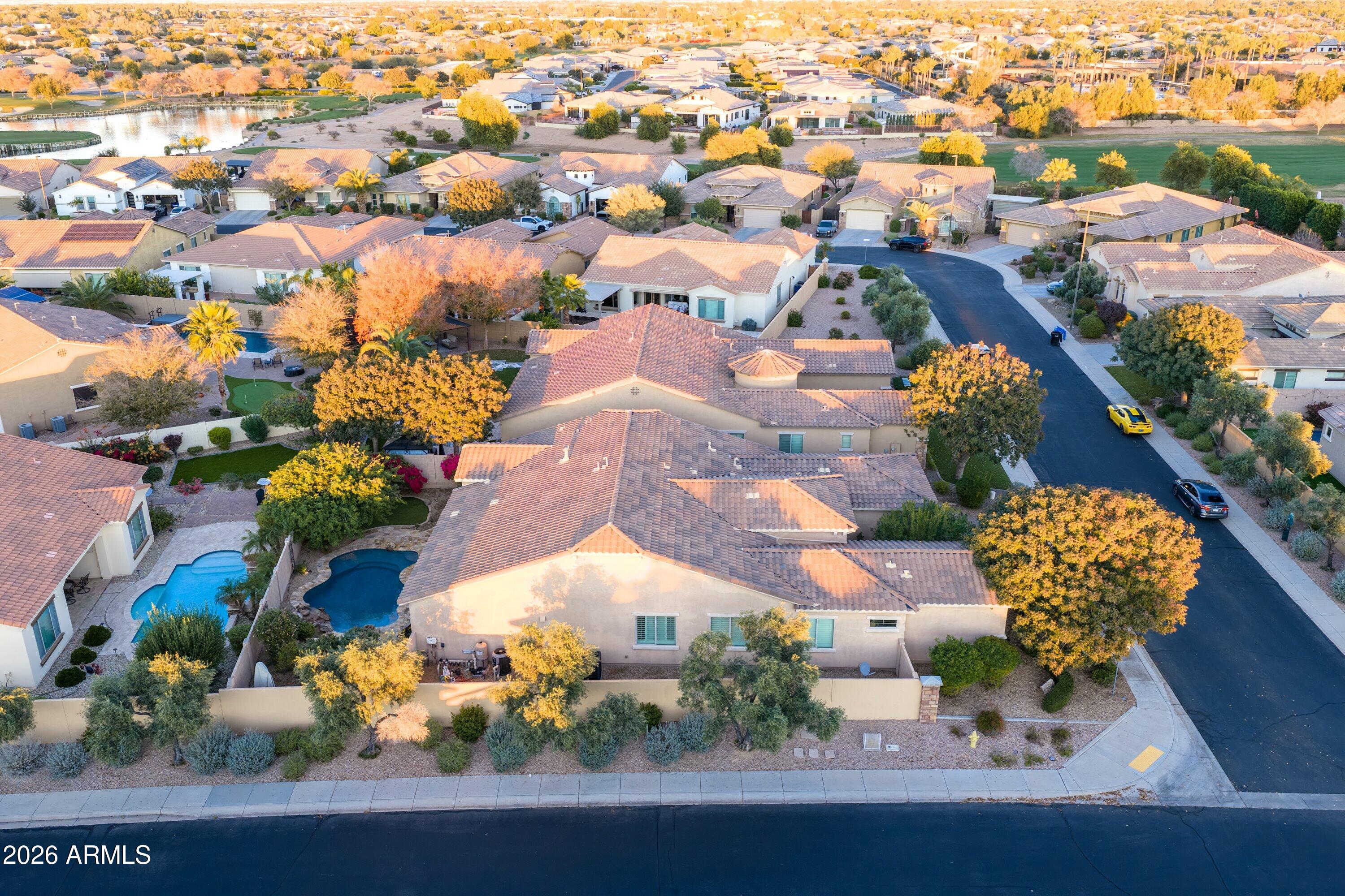 3738 East Riopelle Avenue Gilbert, AZ 85298 - Photo 63 of 97 an aerial view of residential houses with outdoor space