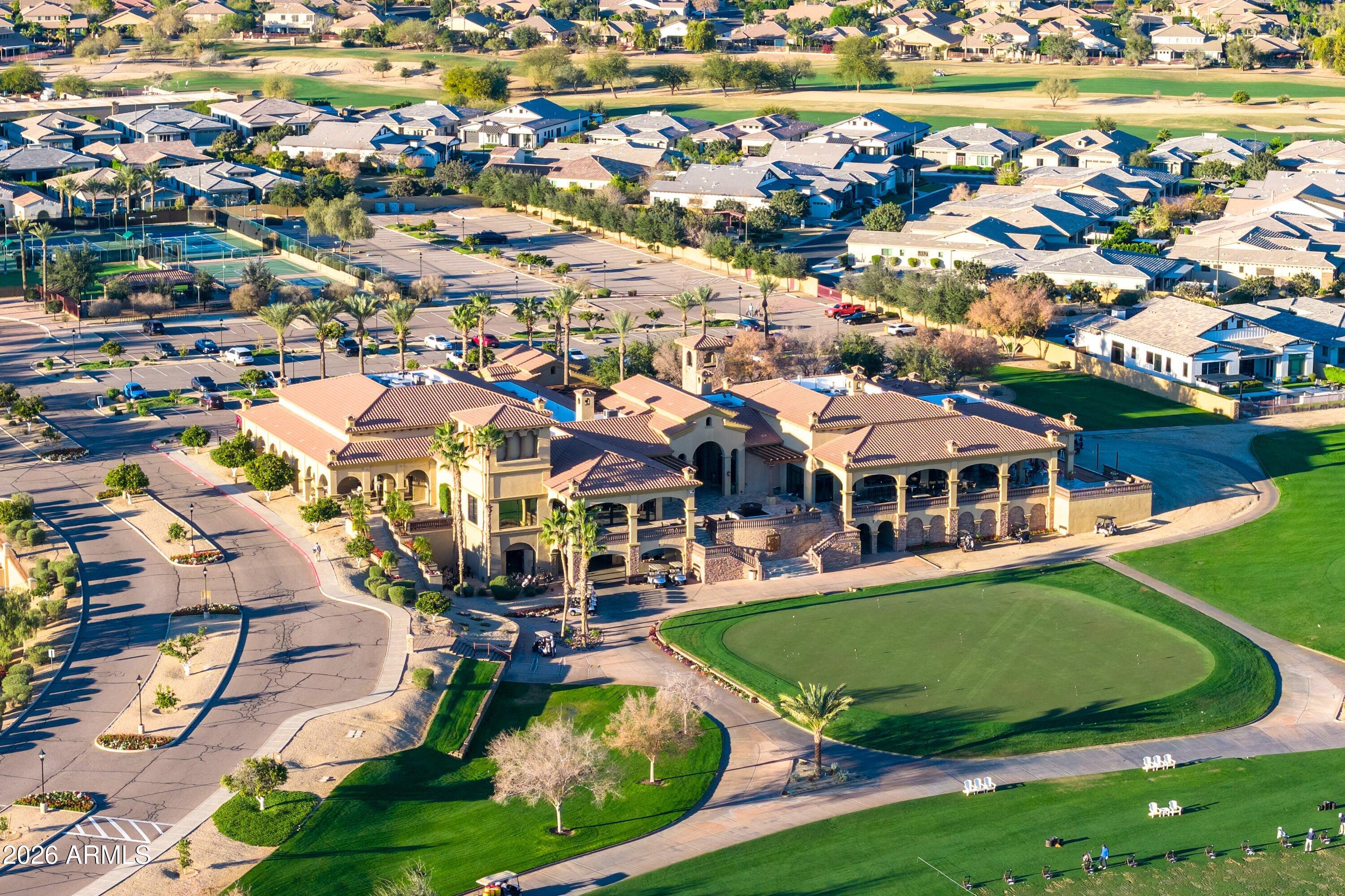 3738 East Riopelle Avenue Gilbert, AZ 85298 - Photo 68 of 97 an aerial view of a house with a garden and lake view