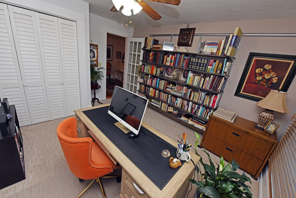 63 Loving Road Morganton, GA 30560 - Photo 44 of 58 a room with furniture and book shelf
