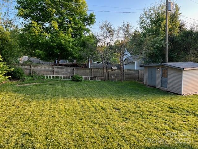 70 3rd Street, Unit 87 Marion, NC 28752 - Photo 15 of 22 a view of a backyard with a small cabin