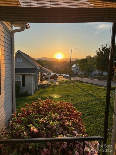 70 3rd Street, Unit 87 Marion, NC 28752 - Photo 3 of 22 a view of a back yard of the house