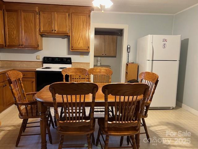 70 3rd Street, Unit 87 Marion, NC 28752 - Photo 7 of 22 a view of a dining room with furniture