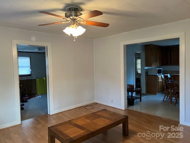 70 3rd Street, Unit 87 Marion, NC 28752 - Photo 8 of 22 a living room with furniture and a chandelier