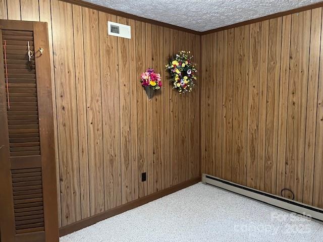70 3rd Street, Unit 87 Marion, NC 28752 - Photo 10 of 22 a view of a hallway with a flower pot