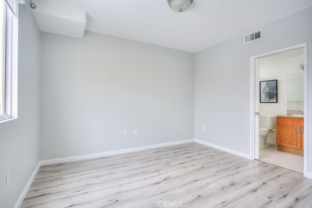 580 West Main Street, Unit 302 Alhambra, CA 91801 - Photo 22 of 41 wooden floor in an empty room