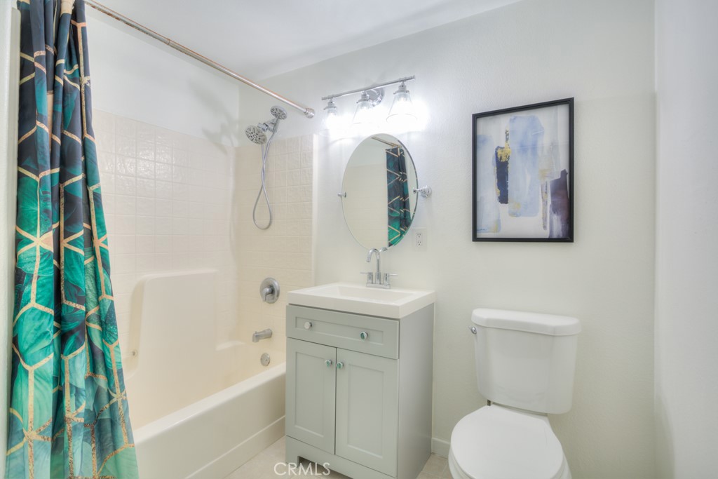 580 West Main Street, Unit 302 Alhambra, CA 91801 - Photo 30 of 41 a bathroom with a toilet sink and bathtub