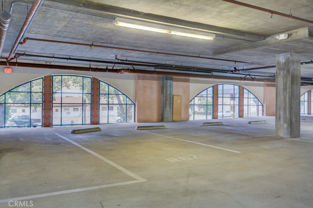580 West Main Street, Unit 302 Alhambra, CA 91801 - Photo 40 of 41 a view of an empty room with a window