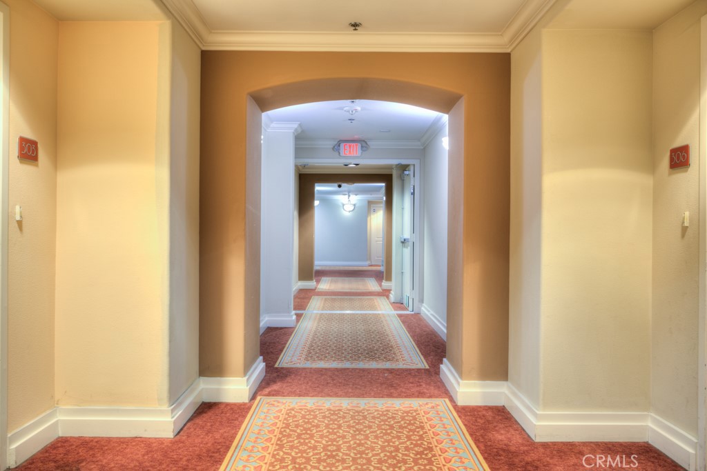 580 West Main Street, Unit 302 Alhambra, CA 91801 - Photo 5 of 41 a view of a hallway with wooden floor