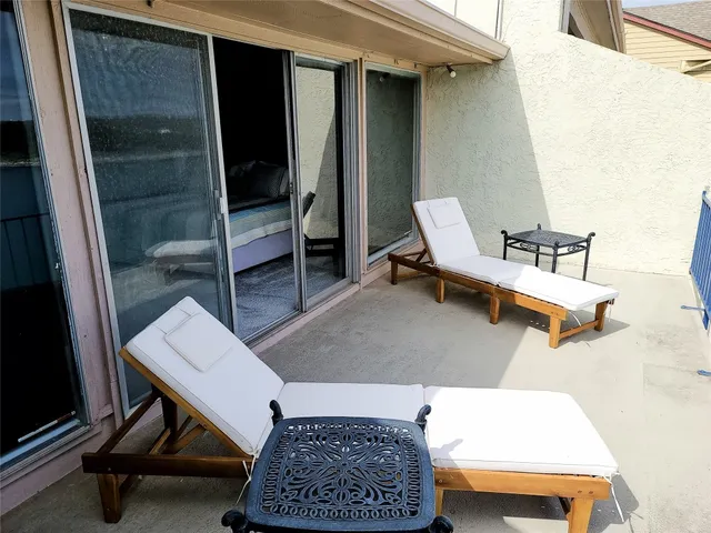 a bed room with a bed and a mirror