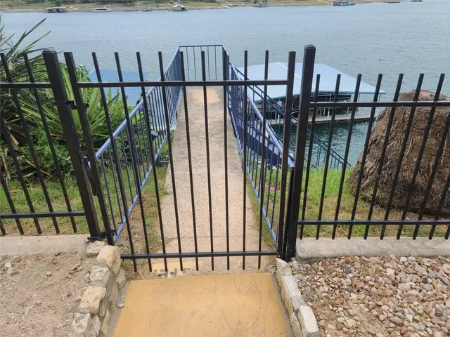 a view of a lake with a big yard