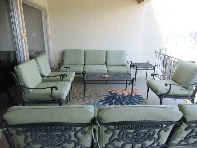 a view of deck with patio and mountain view