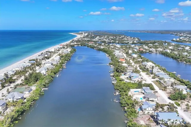 a view of an ocean and city