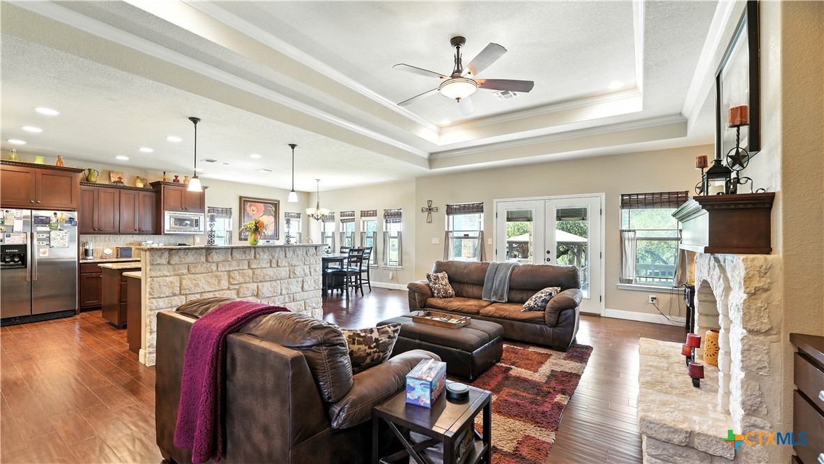121 Carrizo Ridge Floresville, TX 78114 - Photo 13 of 43 a living room with furniture and kitchen view