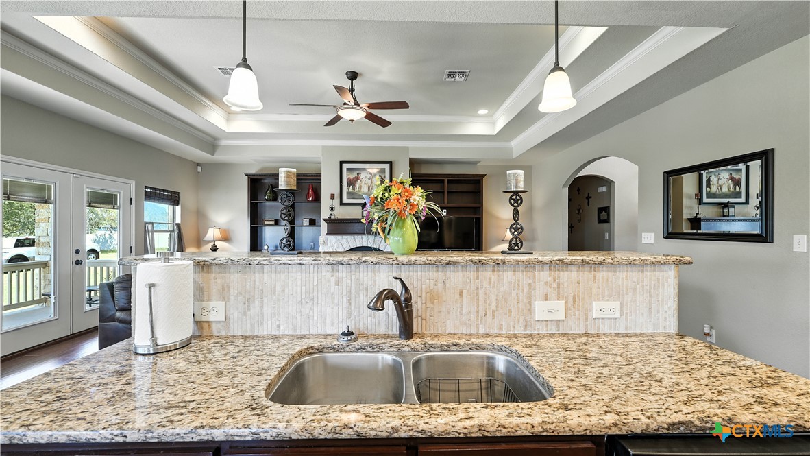 121 Carrizo Ridge Floresville, TX 78114 - Photo 16 of 43 a view of a living room and kitchen