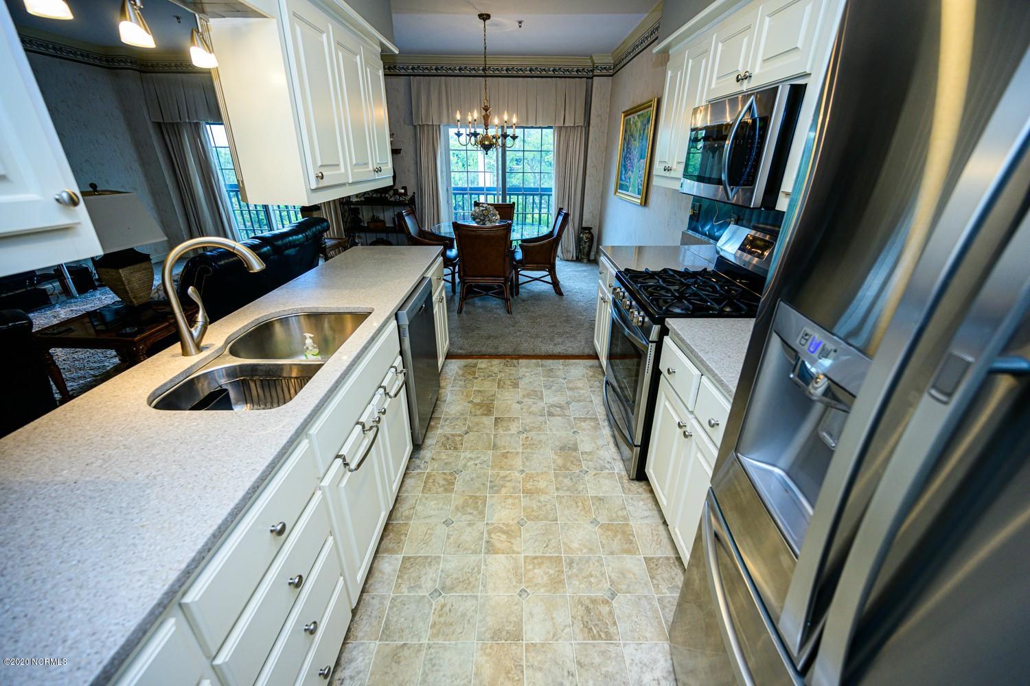 212 Middle Street, Unit 301 New Bern, NC 28560 - Photo 11 of 25 kitchen to dr 2