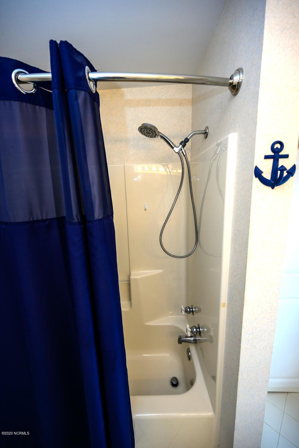 212 Middle Street, Unit 301 New Bern, NC 28560 - Photo 20 of 25 hall shower