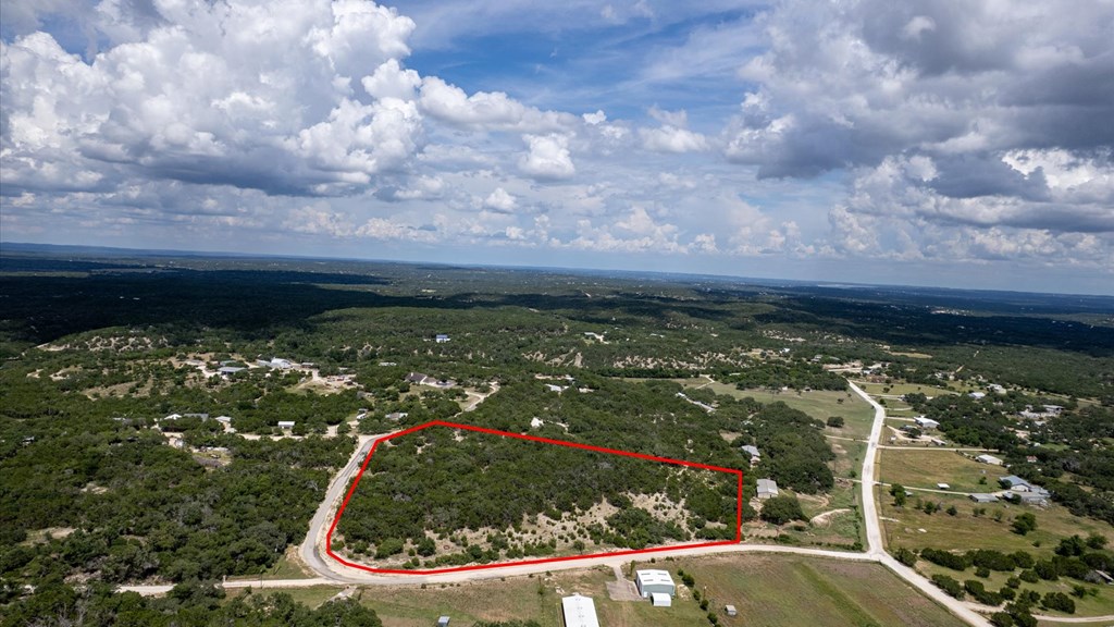 Undisclosed Address Spring Branch, TX 78070 - Photo 12 of 15 a view of a back yard of the house and a yard